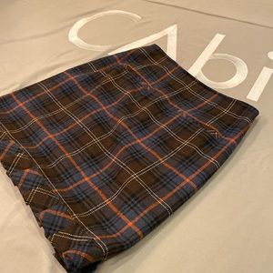 CAbi fully lined, wool blend plaid skirt in neutral colors. Dress it up or down.